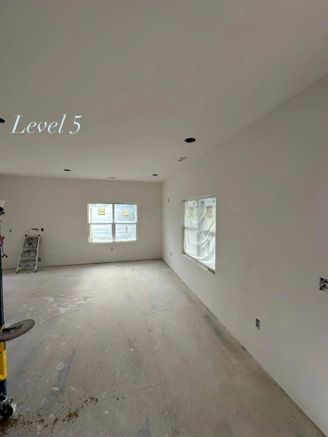 Bright room showing a smooth Level 5 drywall finish
